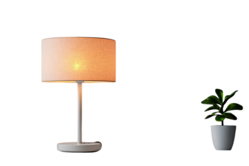 Modern table lamp illuminated beside a small potted plant in a minimalistic setting