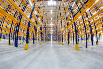 Empty industrial warehouse storage racks with metal structure