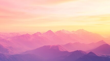 Obraz premium Serene pink and yellow sunset over majestic mountain range