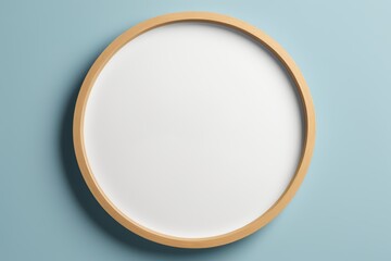 a close up of a clock on a wall with a blue background