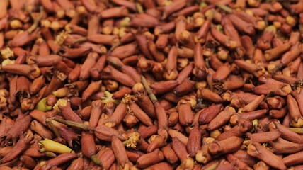 close up of red and brown cloves