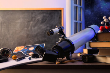 Student desk in science classroom with elescope focusing on sky