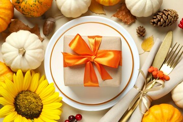 Rustic holiday table setup. Top view with plates, cutlery and autumn decorations. Empty space for your text 