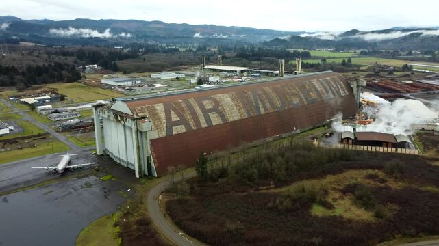 US, Oregon, Tillamook, , 2025-02-18 - Drone view of the WWII Blimp Base (now a museum - Tillamook Air Museum) on the Oregon Coast in winter. This is Hanger A which burned down in 1992