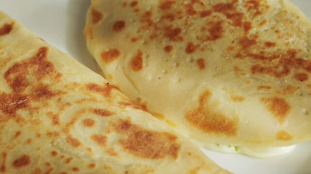 Close up of cheese quesadilla, traditional Mexican food. High quality 4k footage