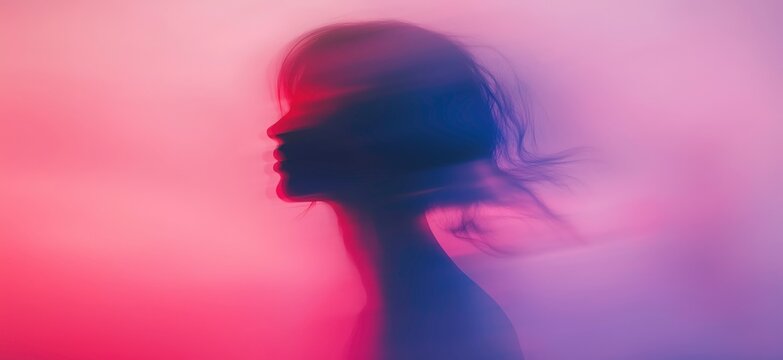 Silhouette of a Woman in a Dream: A captivating artistic image portrays the silhouette of a woman, her form softened by the surrounding motion blur.