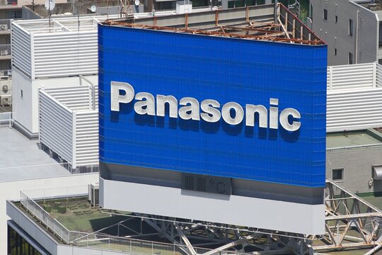 NAGOYA, JAPAN - APRIL 28, 2012: Street view of Panasonic brand huge neon billboard advertisement in Nagoya, Japan.