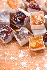 Sweet food Turkish delight, assorted rahat locum in form of cubes with nuts and powdered sugar, traditional food