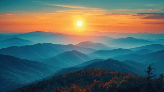 Scenic sunrise over layered mountains with vibrant colors in the eastern sky at dawn