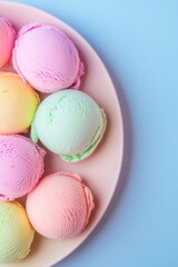 Obraz premium Colorful ice cream scoops arranged neatly on pastel plate evoke