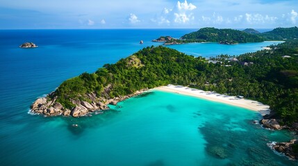Obraz premium Breathtaking aerial view of turquoise waters and lush green tropical islands.