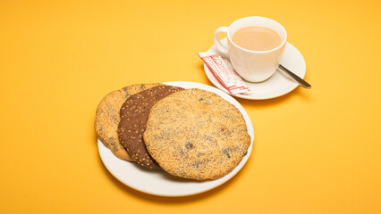 Fast food on plate with yellow background