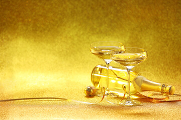 Champagne in glasses and bottle on golden background. Space for text © New Africa