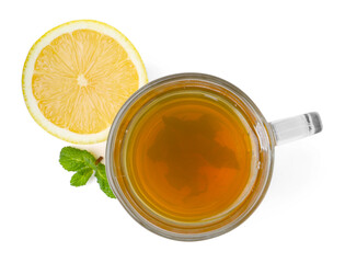 Aromatic mint tea with lemon, fresh and dried leaves isolated on white