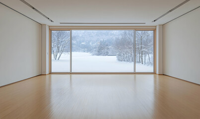 Fototapeta premium Empty room showcases tranquil snowy landscape through window.