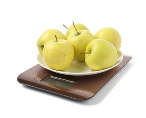 Modern electronic kitchen scale with apples isolated on white
