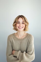 Happy woman smiling portrait sweater blonde.