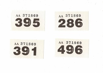 Vintage raffle tickets on a white background.