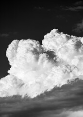 black and white photograph of large clouds in the sky