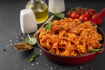 Mafaldine pasta with bolognese tomato sauce