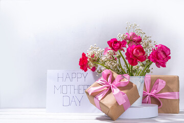 Mothers day gift and flowers background
