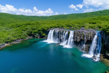 Fototapeta premium A breathtaking aerial view of multiple waterfalls converging into one large cascade