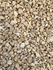 Close-up of stones on the beach,grey granite gravel background for mixed concrete