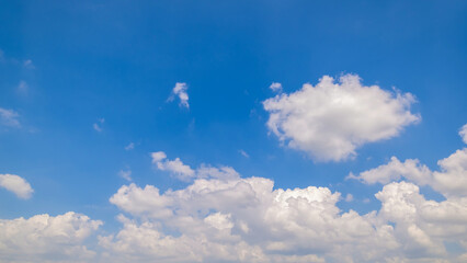 clear blue sky background,clouds with background, Blue sky background with tiny clouds. White fluffy clouds in the blue sky. 
