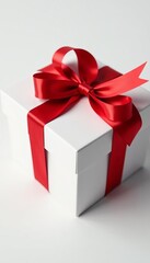 Fototapeta premium A close-up of an open gift box with a shiny red ribbon on a white background, holiday, surprise