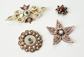 Fototapeta premium Elegant handmade button brooches, creative kids' gift for parents, unique and artistic accessories