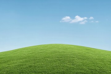 Fototapeta premium Lush green hill under clear blue sky, evoking tranquility and na