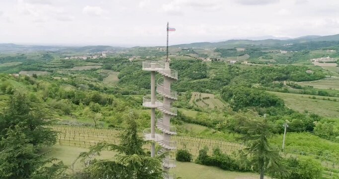 Aerial drone view pan of the Collio hills, Cormons, Nova Gorica near Gorizia. European Capital of Culture 2025. Typical local products vineyards and wines. Gonjače Tower places to visit and tradition.