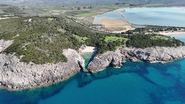 Aerial view of secluded beach of Glossa near Voidokilia, Pylos, Greece