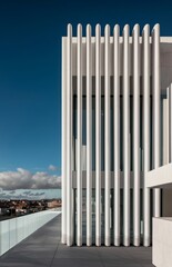 Fototapeta premium The image depicts a data center building featuring a security camera set against a clear blue sky on a sunny day