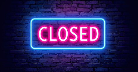 Fototapeta premium Neon closed sign on brick wall background for business closure themes