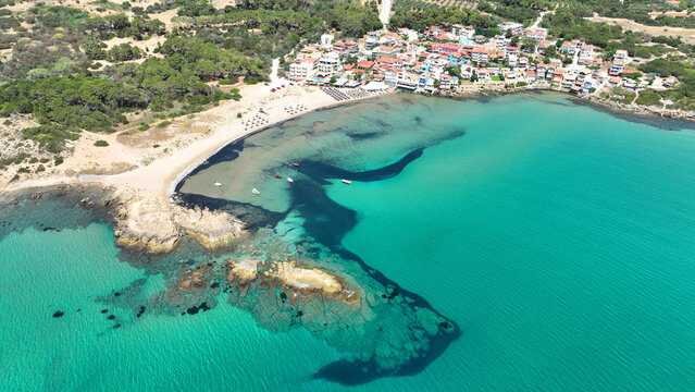 Aerial drone photo of small seaside village and circular sandy beach of Arkoudi in Western Peloponnese, Ilia prefecture, Greece