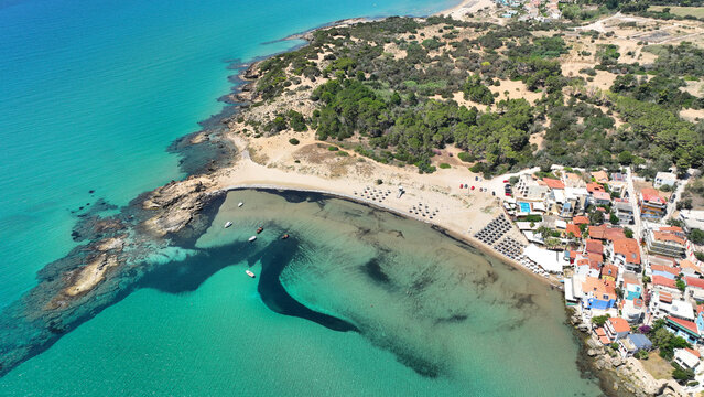Aerial drone photo of small seaside village and circular sandy beach of Arkoudi in Western Peloponnese, Ilia prefecture, Greece