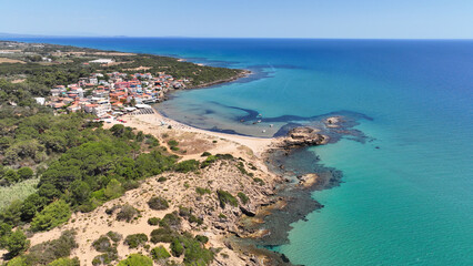 Aerial drone photo of small seaside village and circular sandy beach of Arkoudi in Western Peloponnese, Ilia prefecture, Greece
