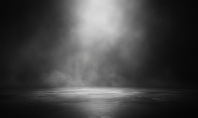 Dark background, a large dark space with light at the bottom of the screen, black and white tones