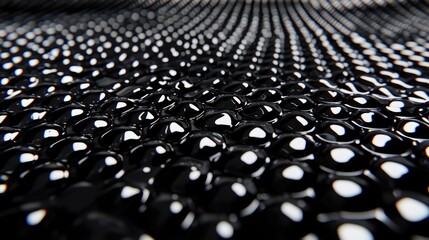 Fototapeta premium Fresh black sturgeon caviar glistening under bright studio light in a close-up macro shot.