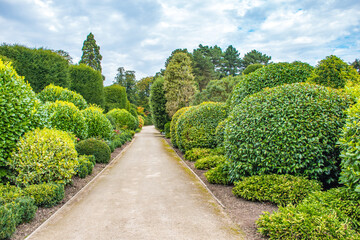 Exploring the grounds and gardens at Brodsworth Hall and Gardens near Doncaster, UK.