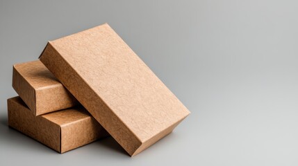 A visually pleasing arrangement of three brown rectangular boxes showcasing minimalist design, ideal for packaging or storage solutions in modern decor.