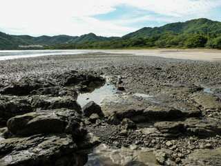 The rocky shore on part of Playa Matapalo in Guanacaste, Costa Rica