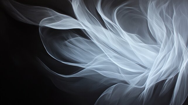 Wisps of white smoke swirling gracefully on a black background, abstract texture for creative projects and artistic designs, ethereal flowing patterns.