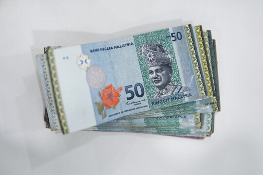 Malaysian ringgit money isolated on white background. currency of Malaysian ringgit banknotes background. Paper money. Financial concept.
