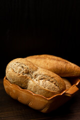 Homemade freshly baked scones on a plate on a black background. Homemade cakes