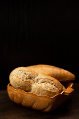 Homemade freshly baked scones on a plate on a black background. Homemade cakes