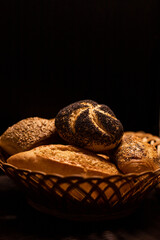 Homemade freshly baked scones on a plate on a black background. Homemade cakes