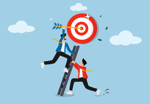 Business team helps to prepare the ladder of success to achieve the target, setting business goals, targets, goals and objectives, partnerships and teamwork towar goals. Developing the ladder.