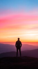 man hilltop pastel sunrise